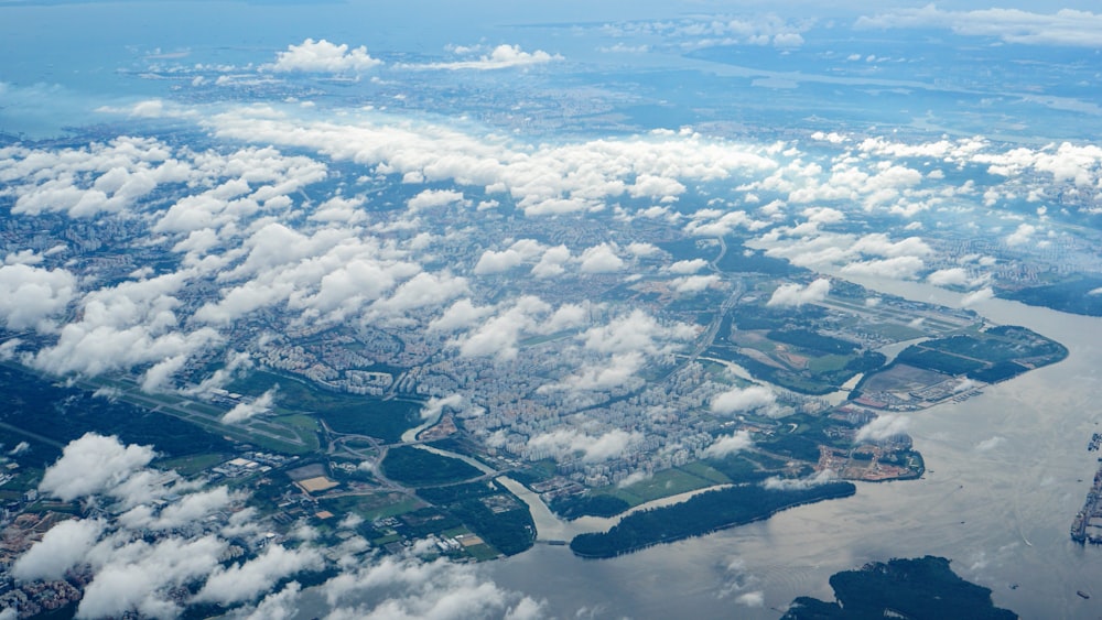 aerial view of land below the clouds