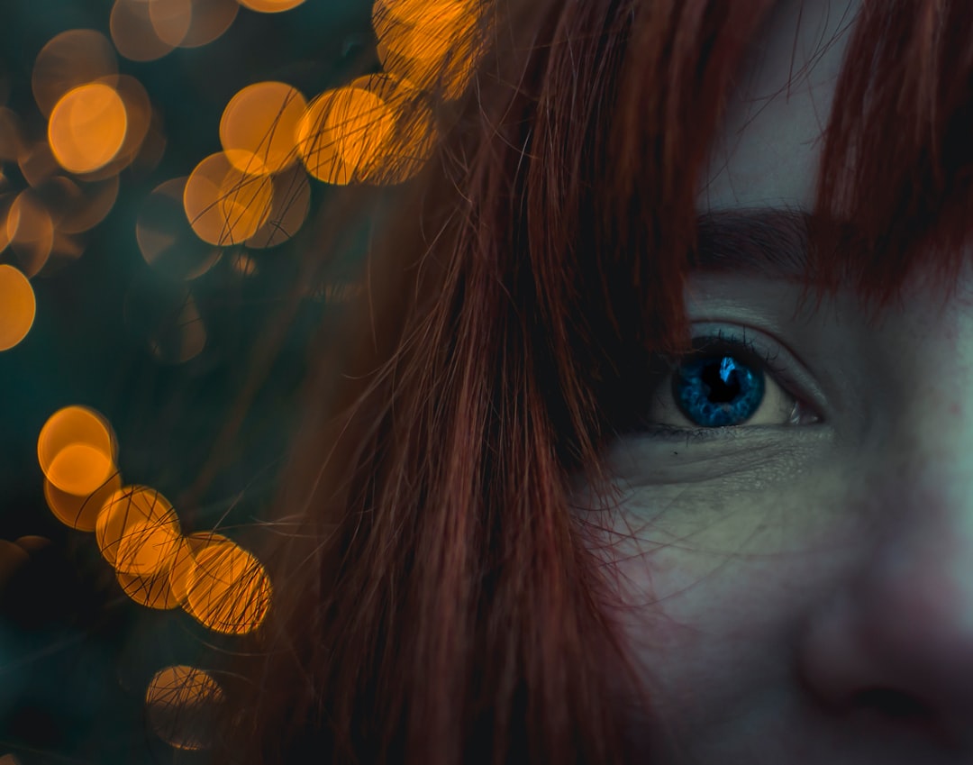 close up photo of red haired woman