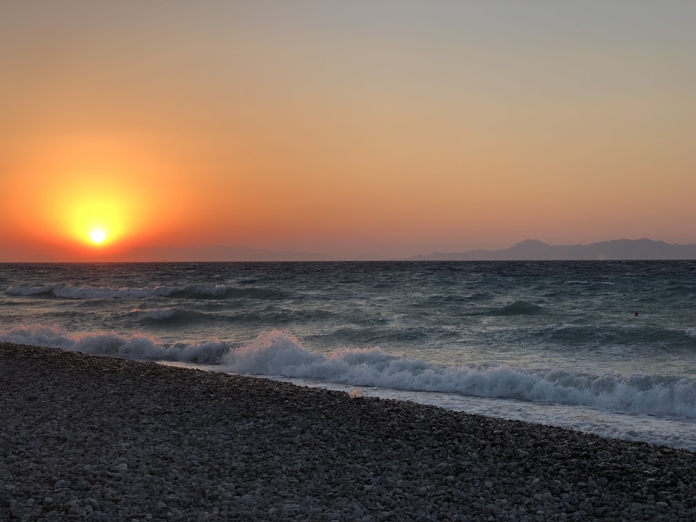 waves and sunset