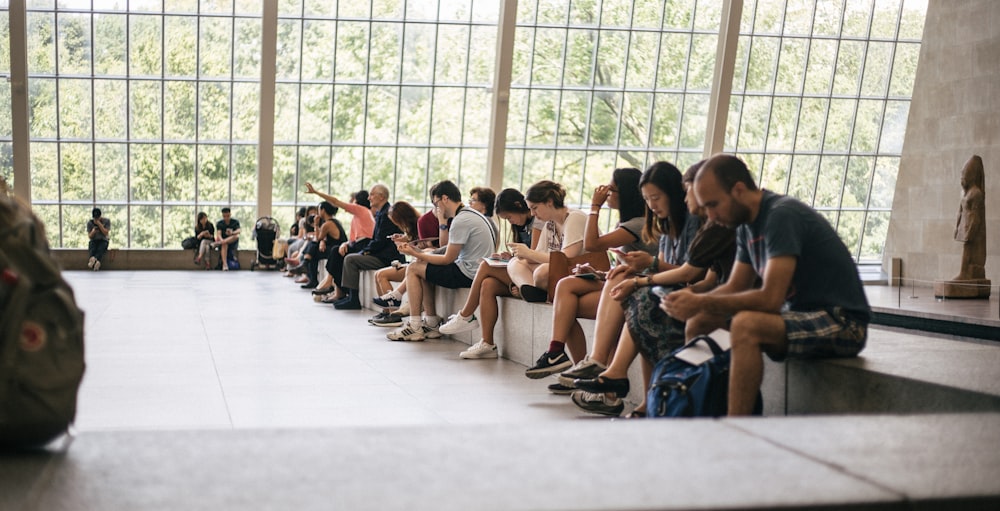 people sitting on bench