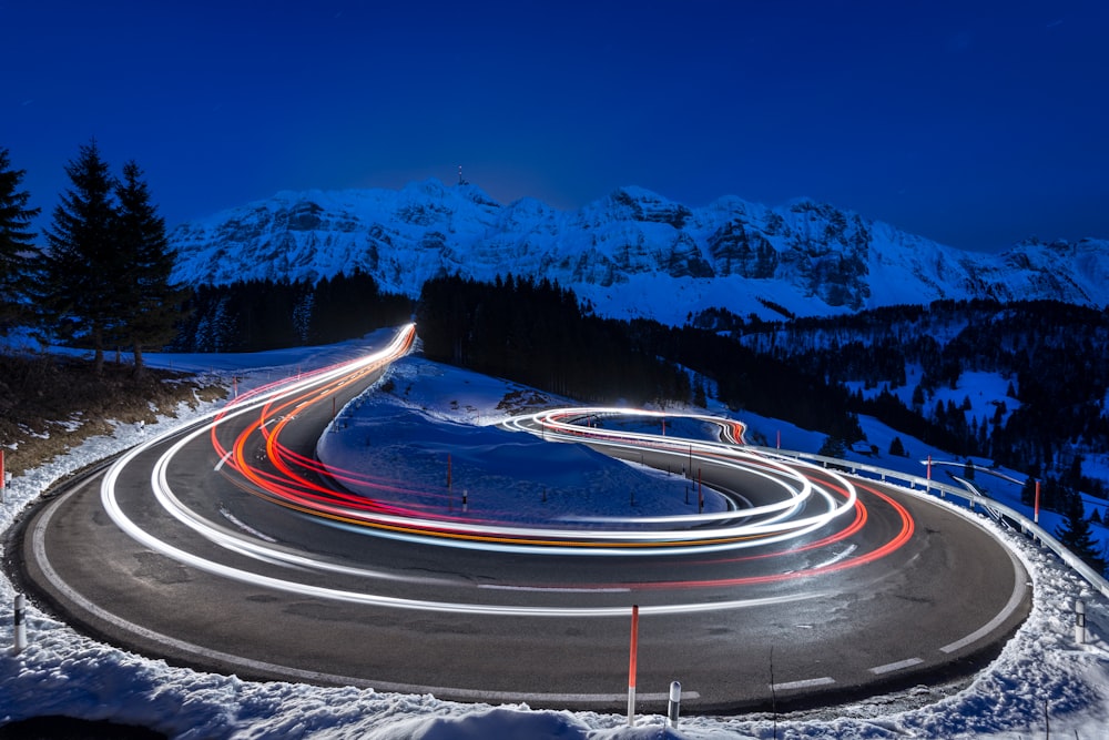 time-lapse photography of curve road