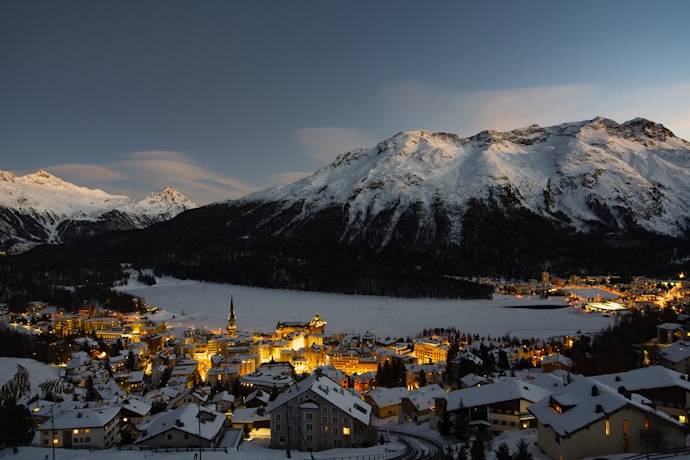 St Moritz snow covered town in winter evening Switzerland