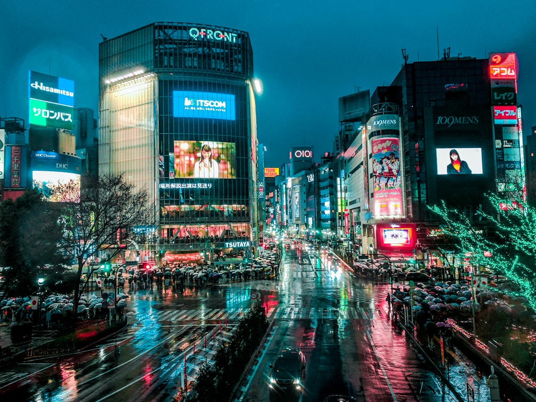 cars on road at night time, This photo was taken through a glass of a bridge at Shibuya.