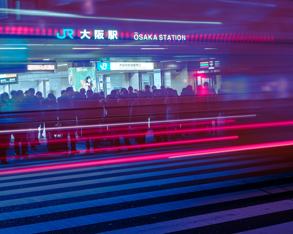 time lapse photography of people in subway