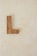 brown wooden L freestanding letter