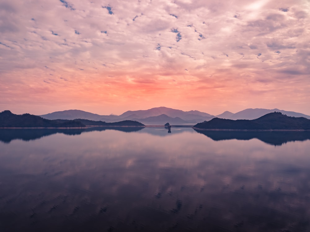 body of water during golden hour