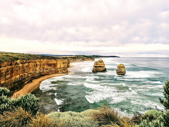 sea and rock formation during daytime in Twelve Apostles Marine National Park Australia