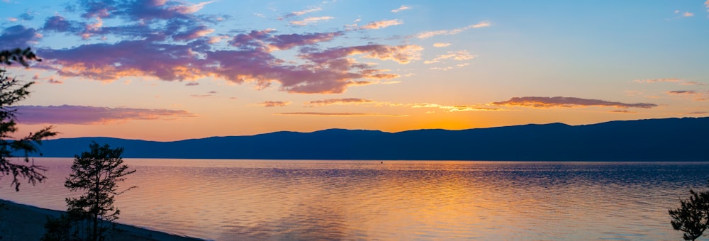 silhouette of mountain during sunset