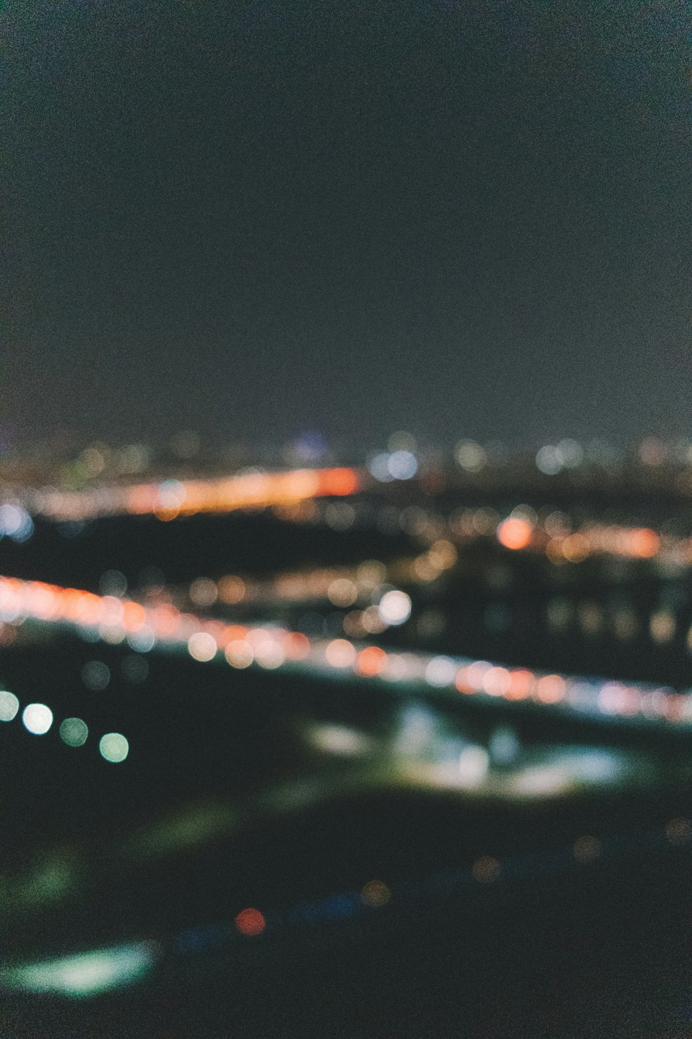 a blurry photo of a city at night