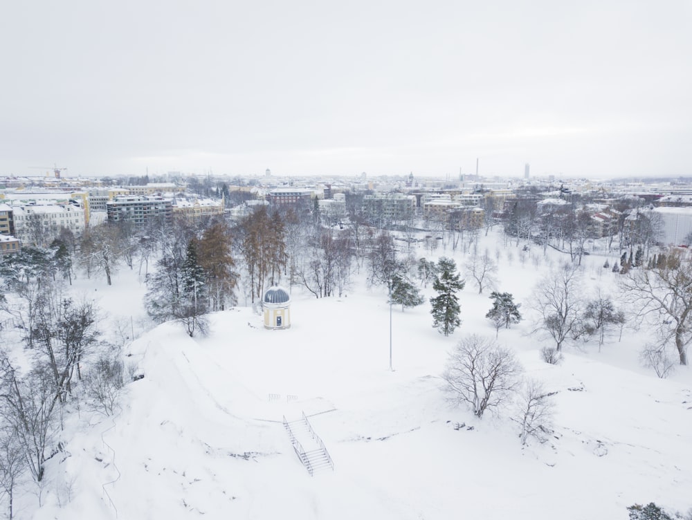 city covered with snow during daytime