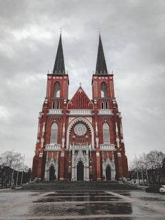 red and white concrete castle during daytime