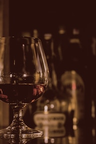 clear wine glass with wine inside