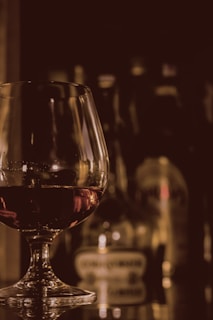 clear wine glass with wine inside