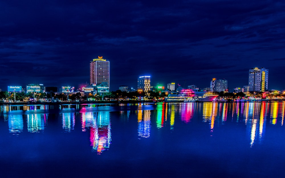 reflection of high rise building on water