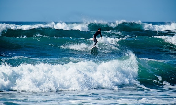 person surfing during daytime