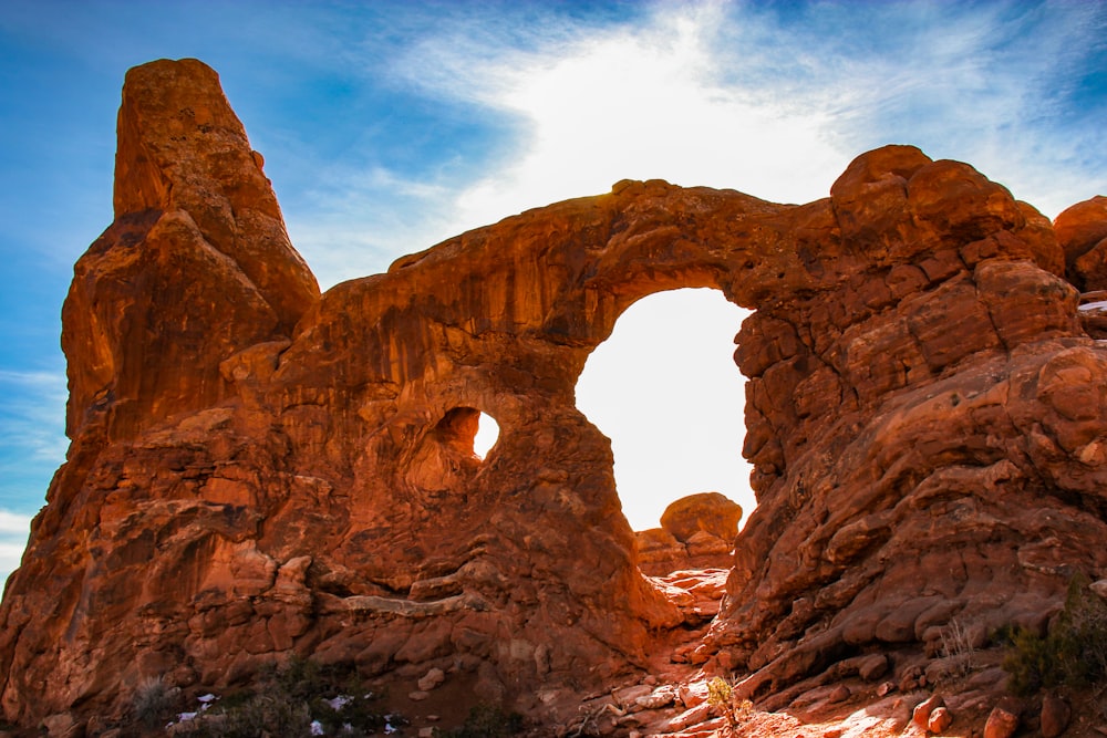 Arizona arch under white skies