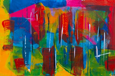 Close-up of a detailed abstract painting with layered paint and dynamic shapes.