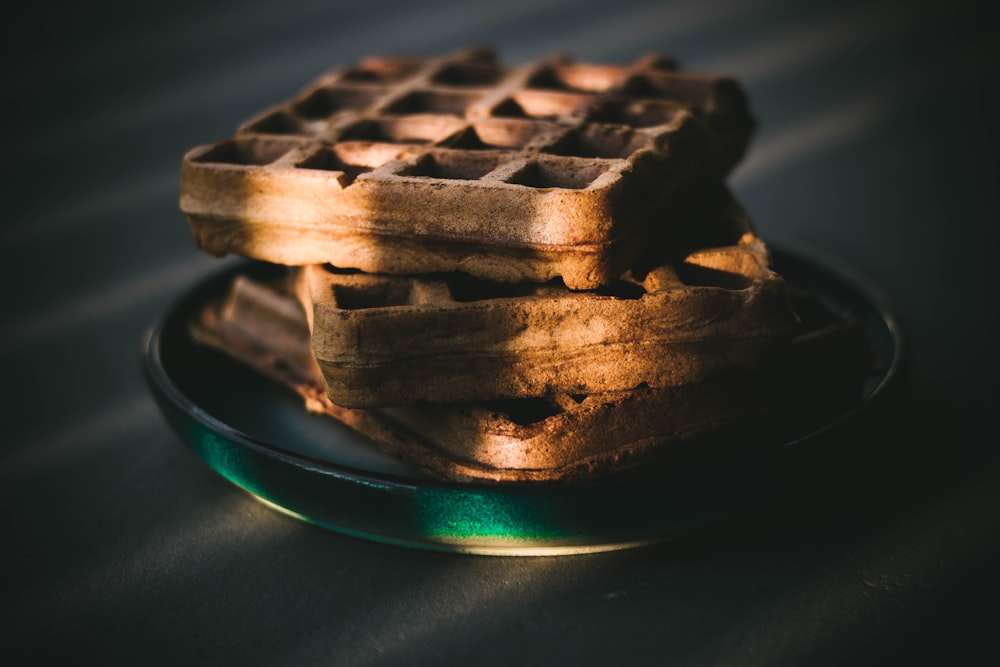 brown chocolates on green plate