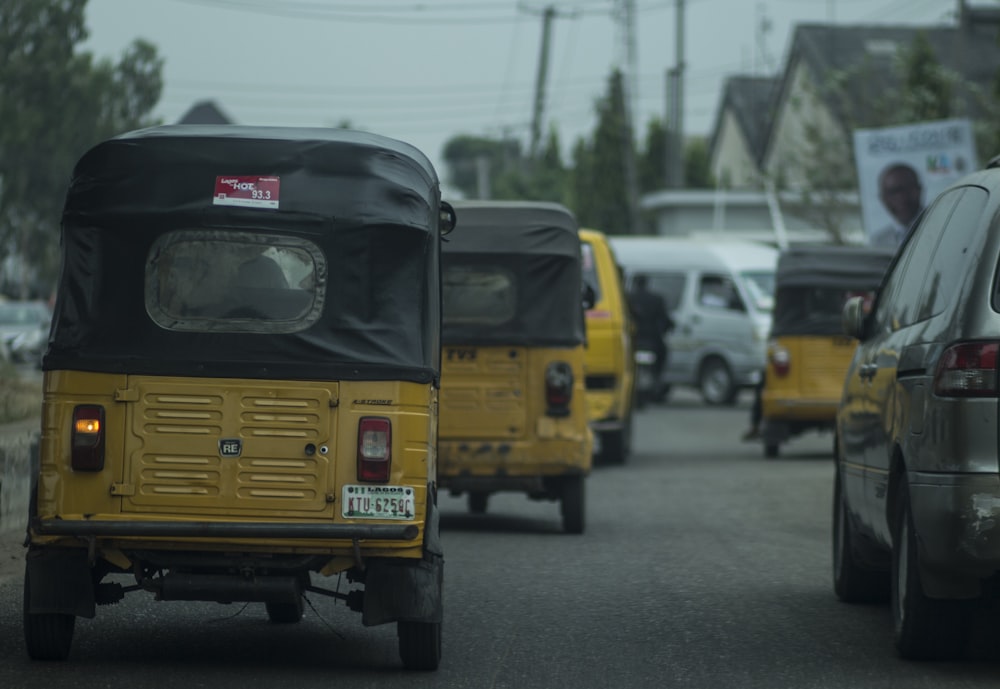 vehicles on road during daytime