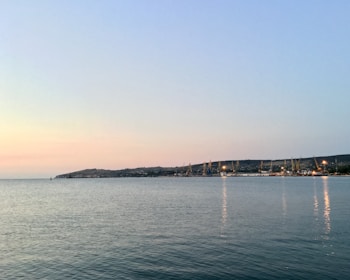 A panoramic view of Southampton harbor at sunset, reflecting our local roots.