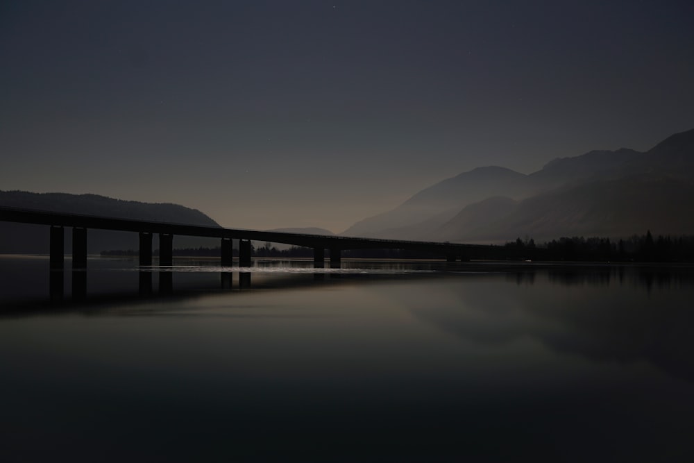 calm body of water and dock