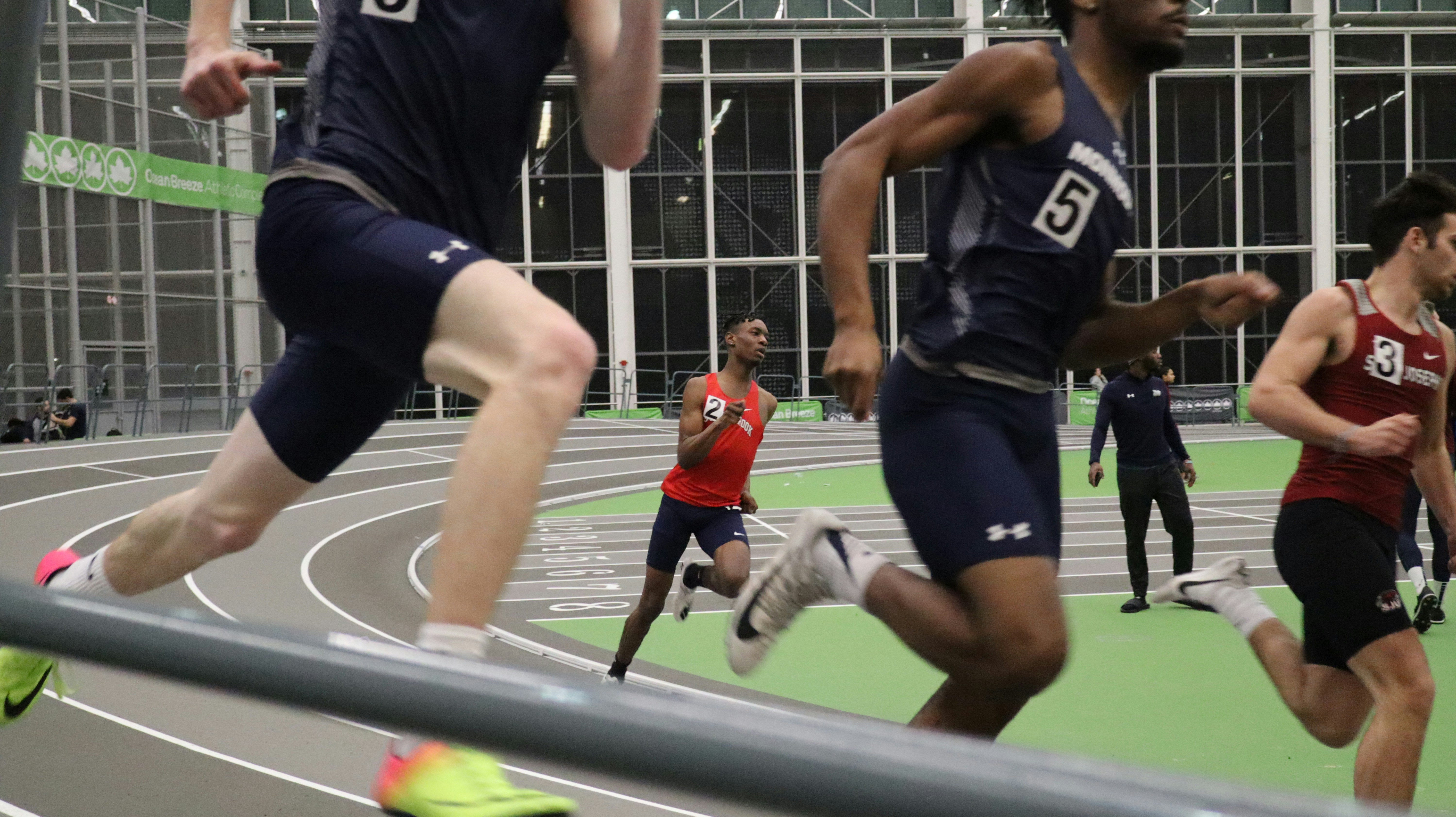 men running on field