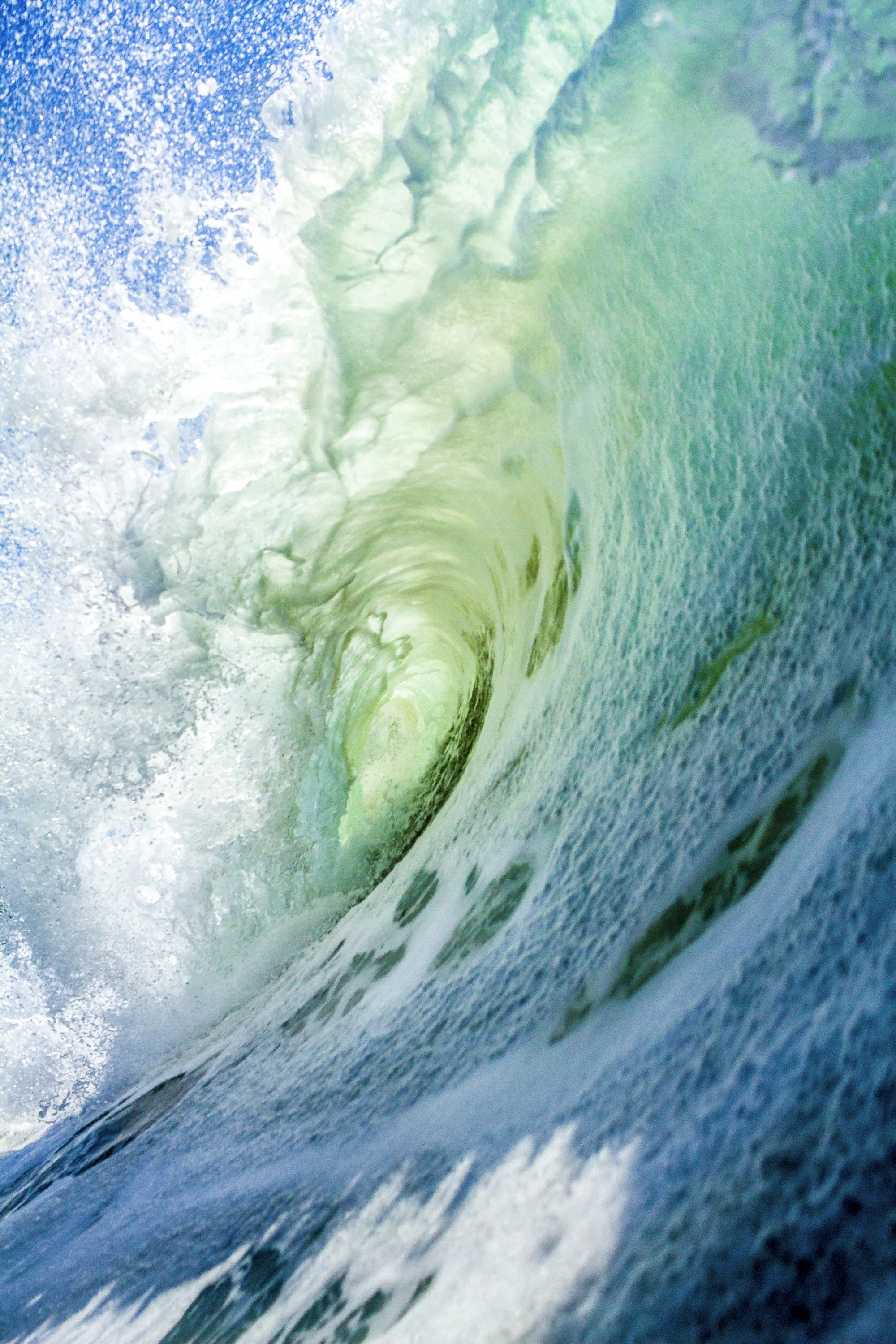 A massive ocean wave curling and about to break