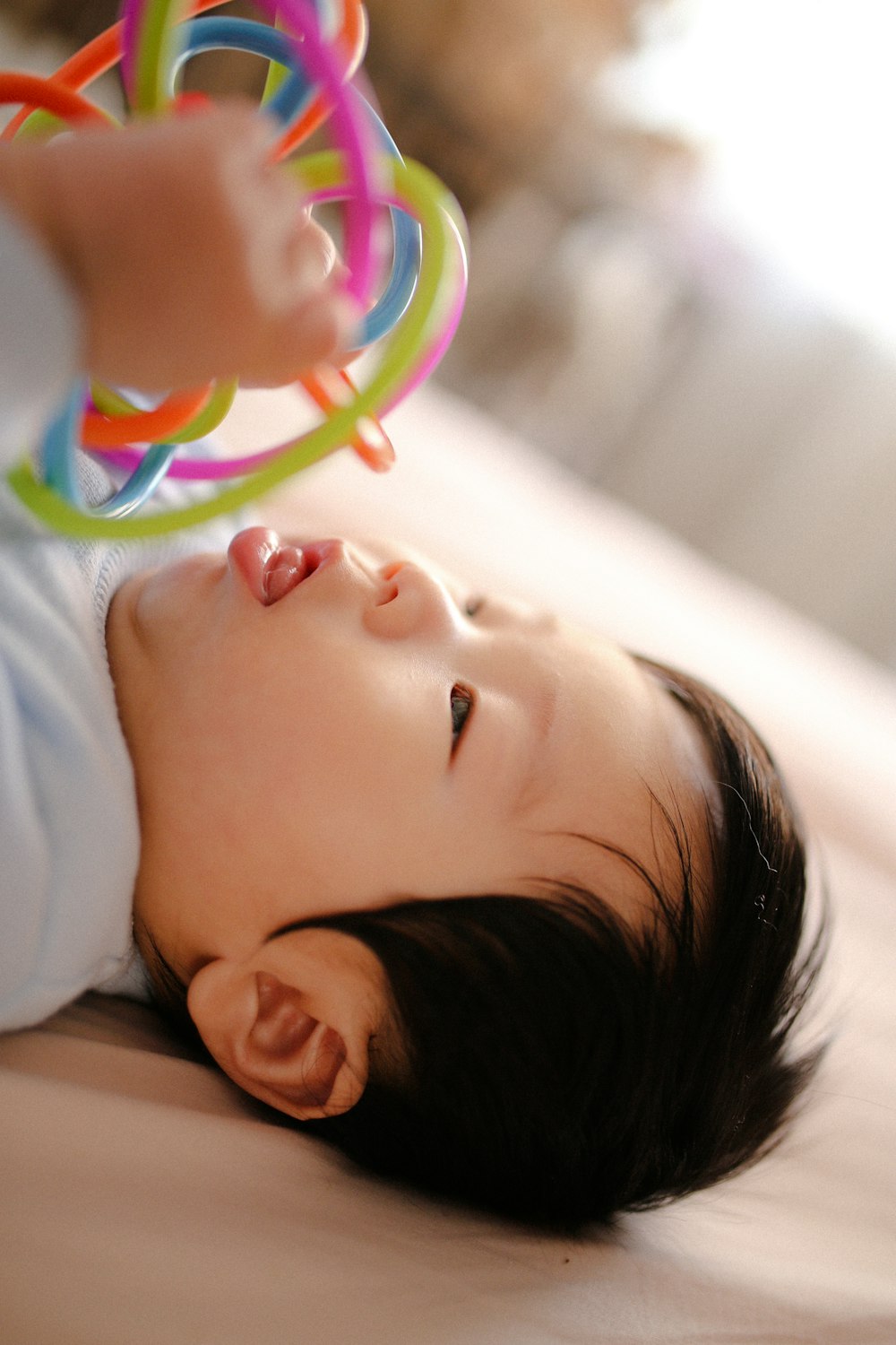 baby playing with toy