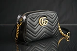 black Gucci leather shoulder bag