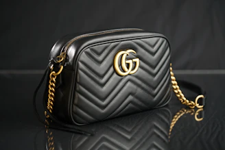 black Gucci leather shoulder bag