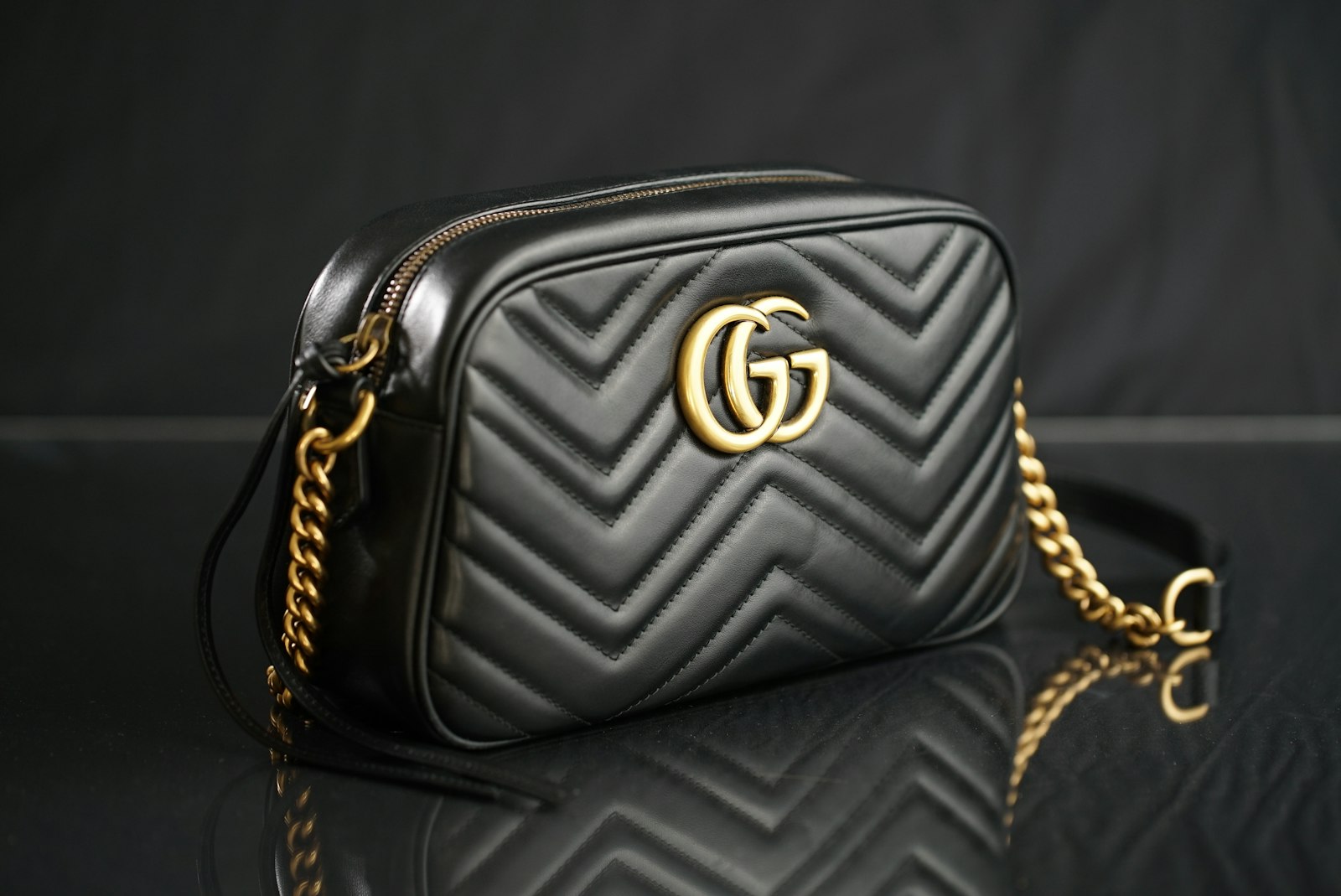 Canon EF 100mm F2.8L Macro IS USM sample photo. Black gucci leather shoulder photography