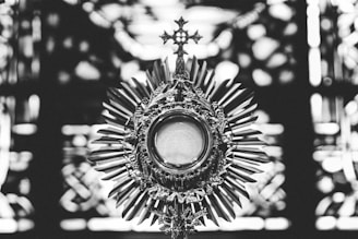 greyscale photo of cross