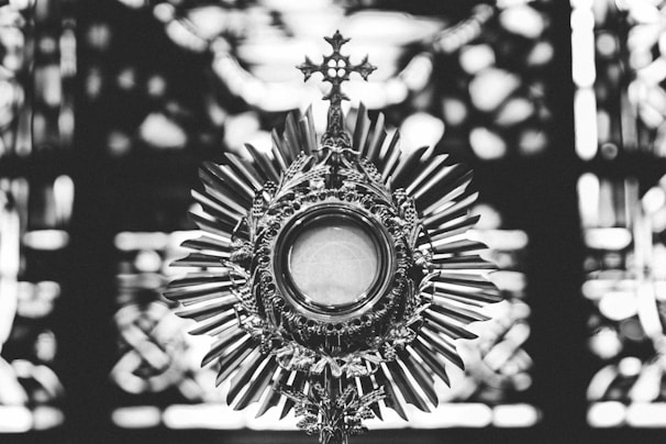 greyscale photo of cross