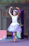 Children dressed in ballet tutus smiling and dancing during a birthday party at the ballet school.