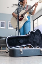 woman playing guitar
