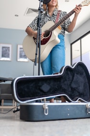 woman playing guitar