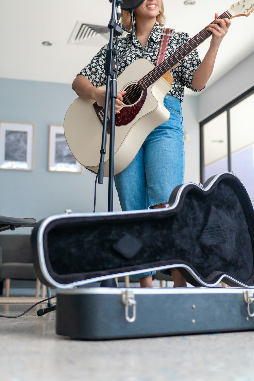 woman playing guitar