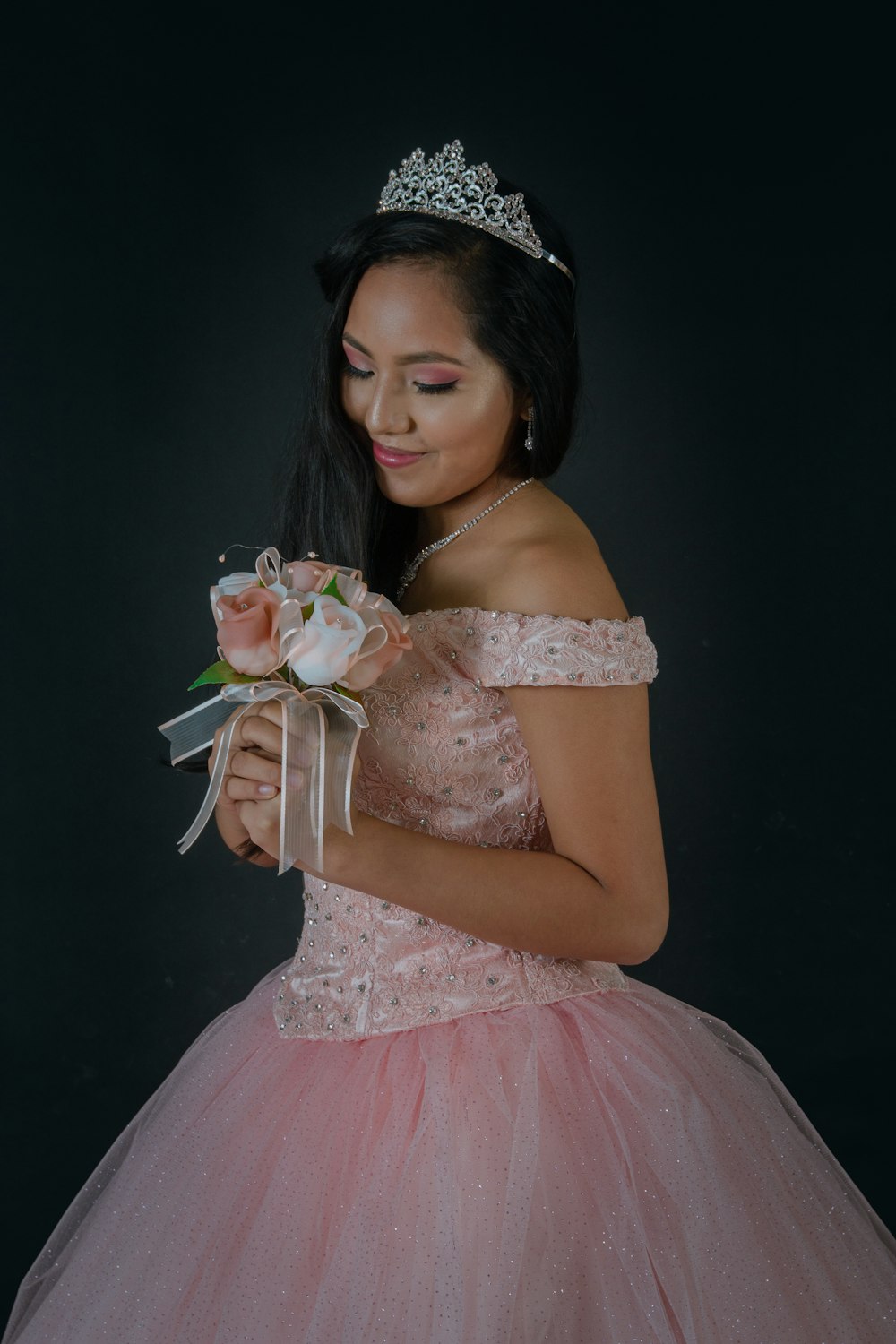 woman wearing pink off-shoulder dress