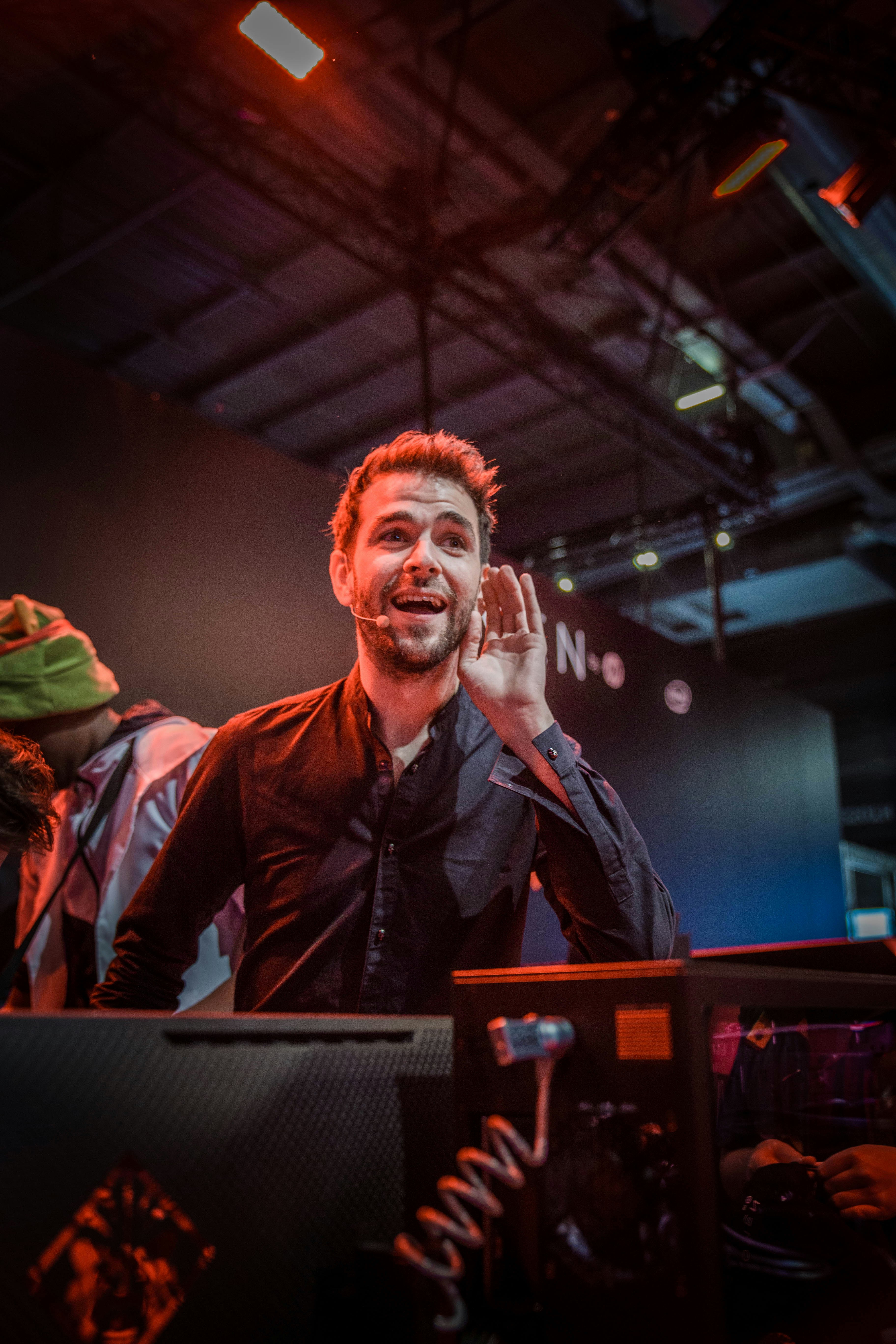 woman wearing yellow long-sleeved dress under white clouds and blue sky during daytime