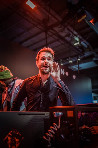 Portrait of Joseph Ekman speaking at a technology standards conference.