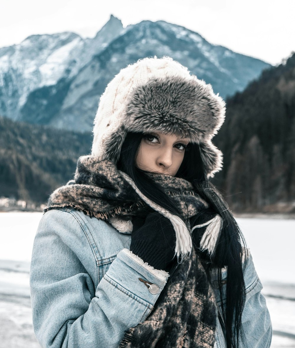 woman standing on front of snow mountain