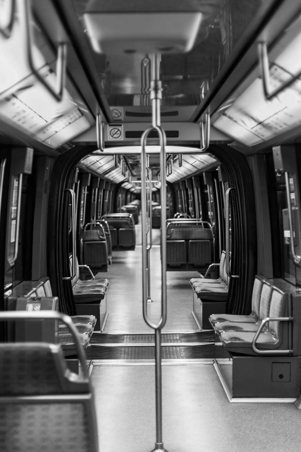 grayscale photography of train interior