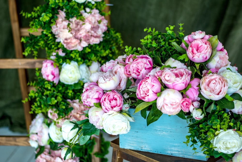 pink peonies in blue box