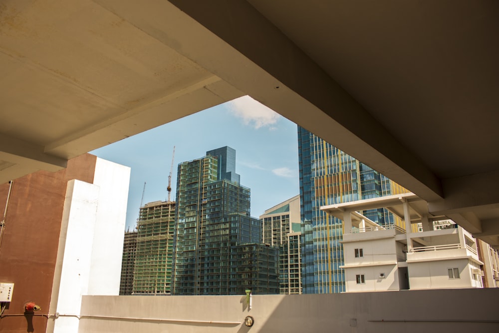 high-rise building through window