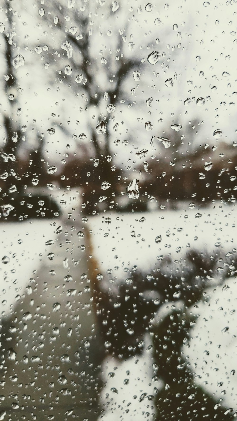 a window with rain drops on it