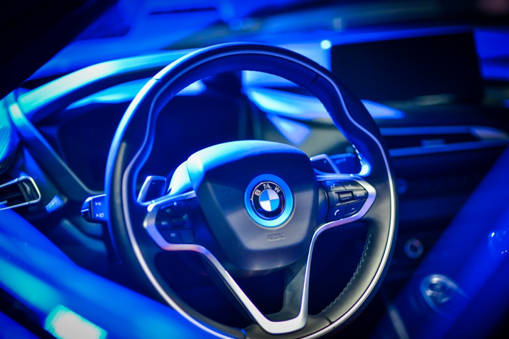 closeup photo of black and gray BMW steering wheel