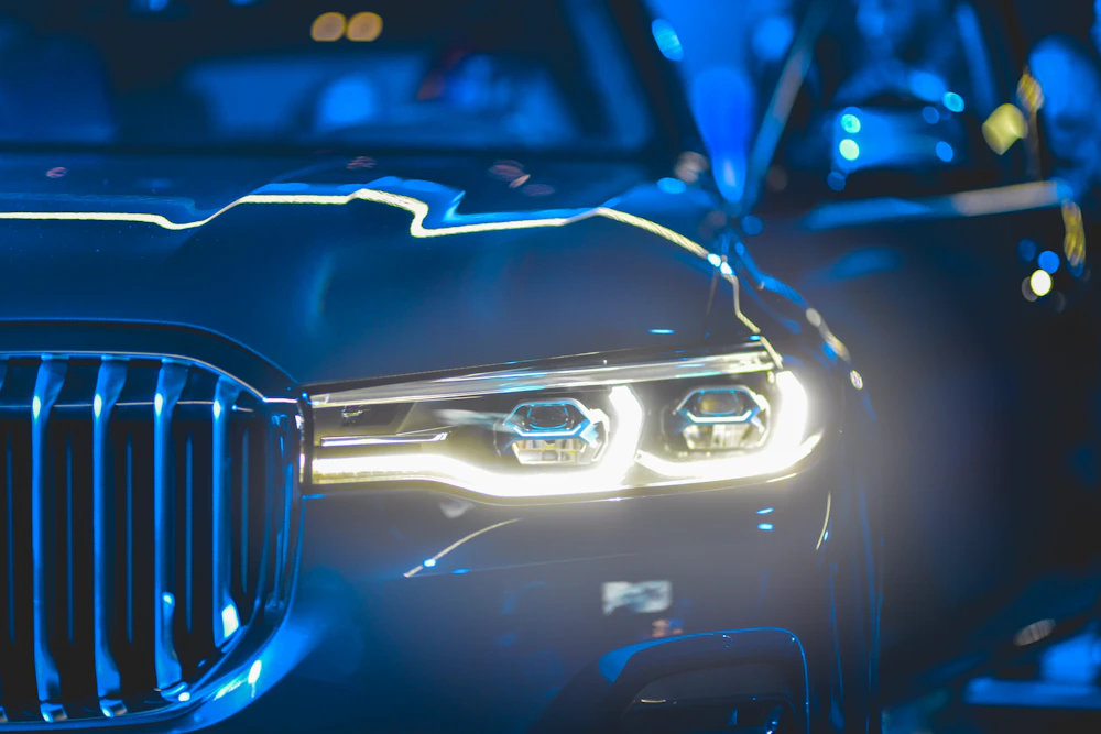 Blue BMW X7 photographed from the front