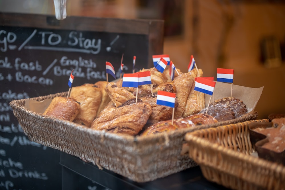 baked pastries on brown wicker basket