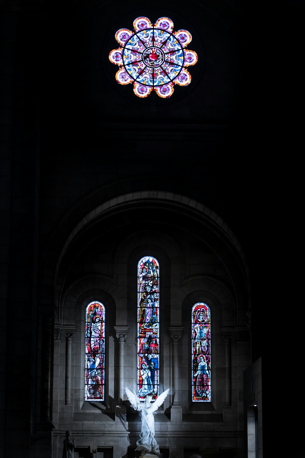 angel statue inside cathedral