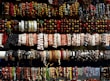 An assortment of bracelets arranged artfully on a marble background.